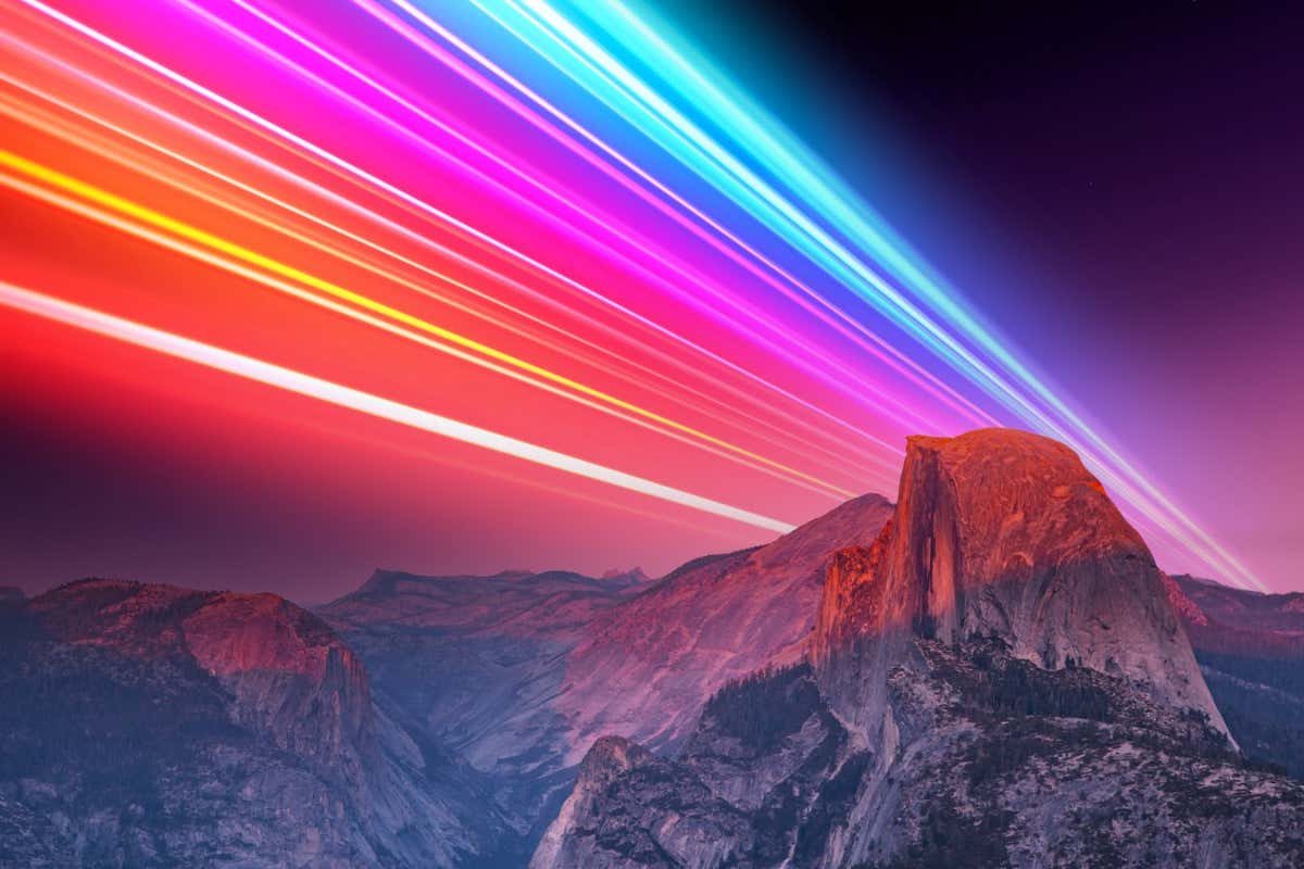 Colorful light trail soaring the sky connecting the world with wireless technology with the Yosemite National Park in California.